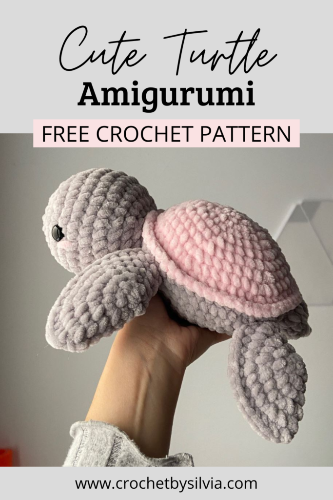 Pinterest pin graphic featuring a handmade plush crochet turtle amigurumi in grey and pink super bulky yarn, held in a hand, with the text 'Cute Turtle Amigurumi - Free Crochet Pattern' and the website watermark crochetbysilvia.com.
