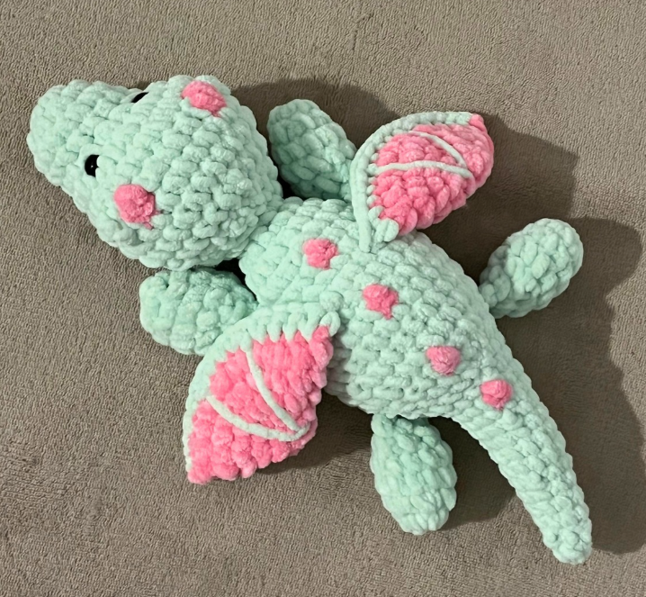 a crochet dragon plush for a free pattern
