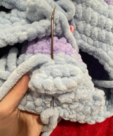Crochet steps showing the front-loop-only shell construction and fin placement for a jumbo sea turtle amigurumi
