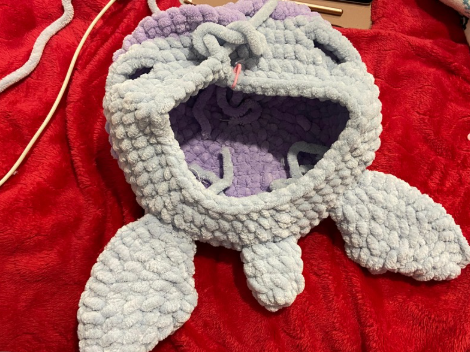 Crochet steps showing the front-loop-only shell construction and fin placement for a jumbo sea turtle amigurumi
