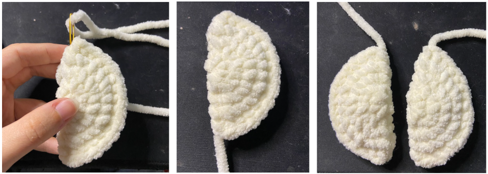 Individual white plush crochet fins folded in half and edged with single crochets.