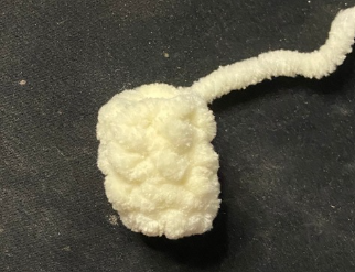 Individual white plush crochet tail for a turtle plush.