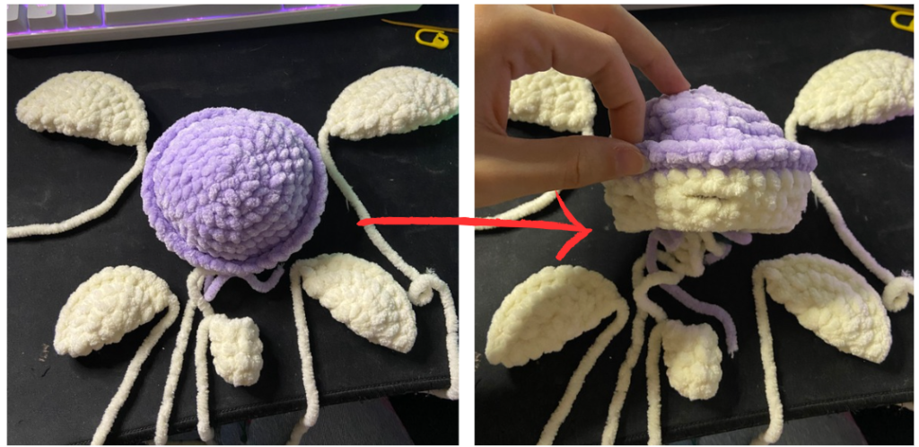 Purple textured amigurumi turtle shell showing the front loops only (FLO) round and openings for the fins.