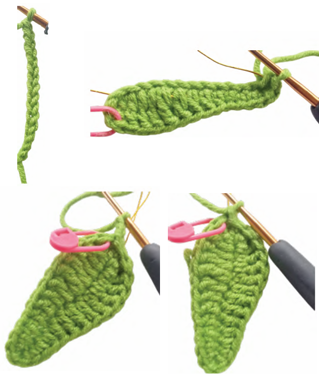 Crochet sunflower leaf in green yarn worked around a piece of floral shaping wire.