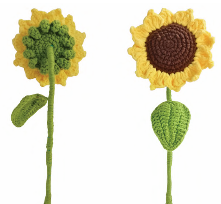 Handmade crochet sunflower amigurumi with a realistic brown center, vibrant yellow petals, and a green wired stem.