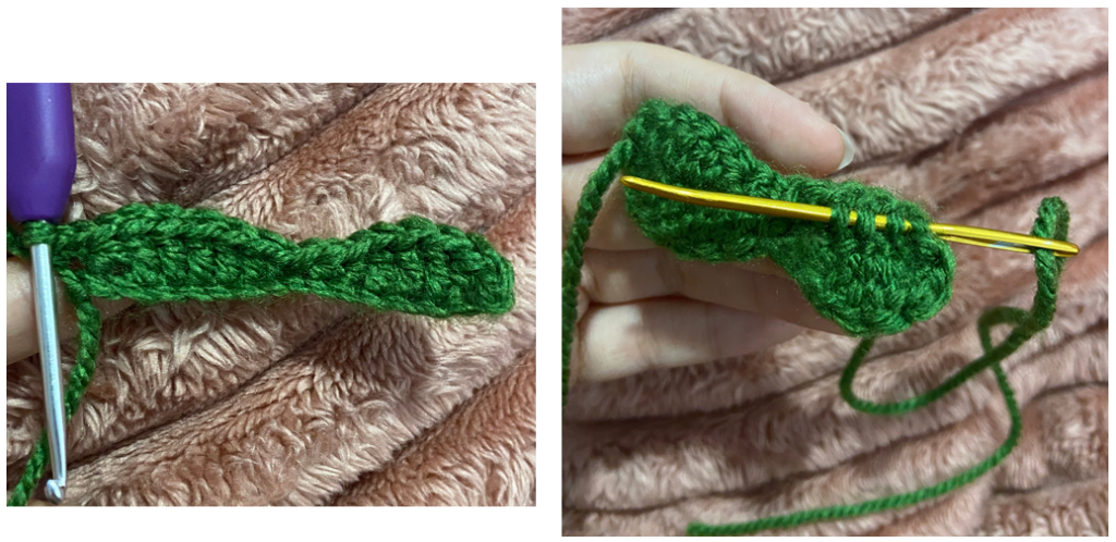 Crocheting green leaves and vine details for the amigurumi pumpkin car accessory.