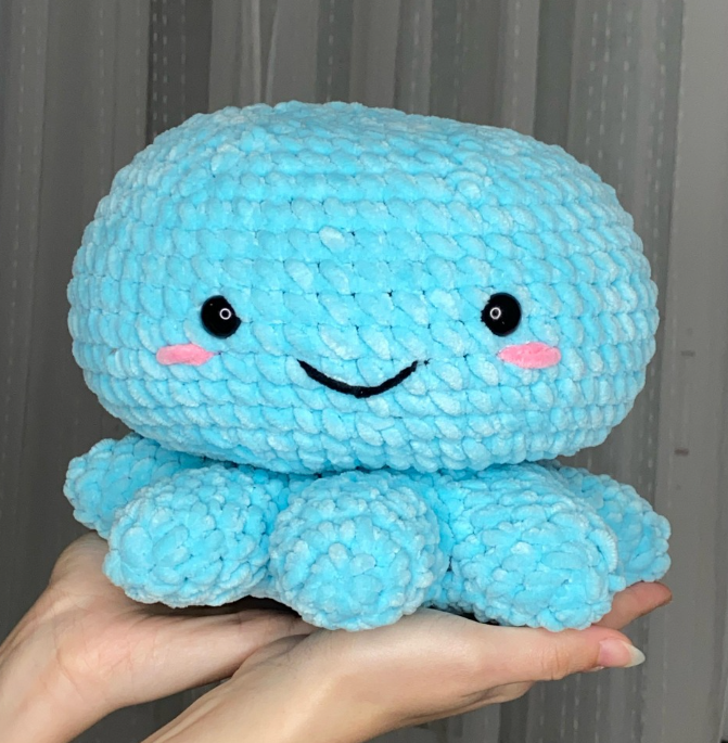 a jumbo blue crochet octopus amigurumi, for a free crochet pattern