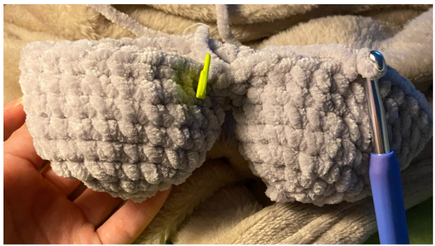Crochet steps showing two individual plush hippo legs joined together to form the seamless main body.