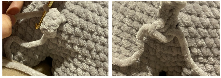 Close-up of the crocheted tail attached to the back of the handmade amigurumi hippo