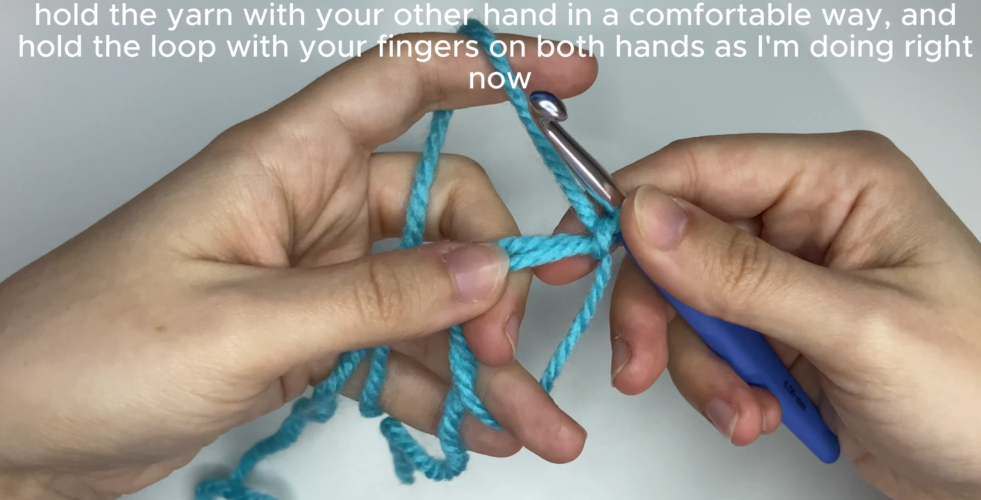Working single crochet stitches into the center of an adjustable magic ring.