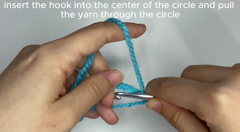 Working single crochet stitches into the center of an adjustable magic ring.