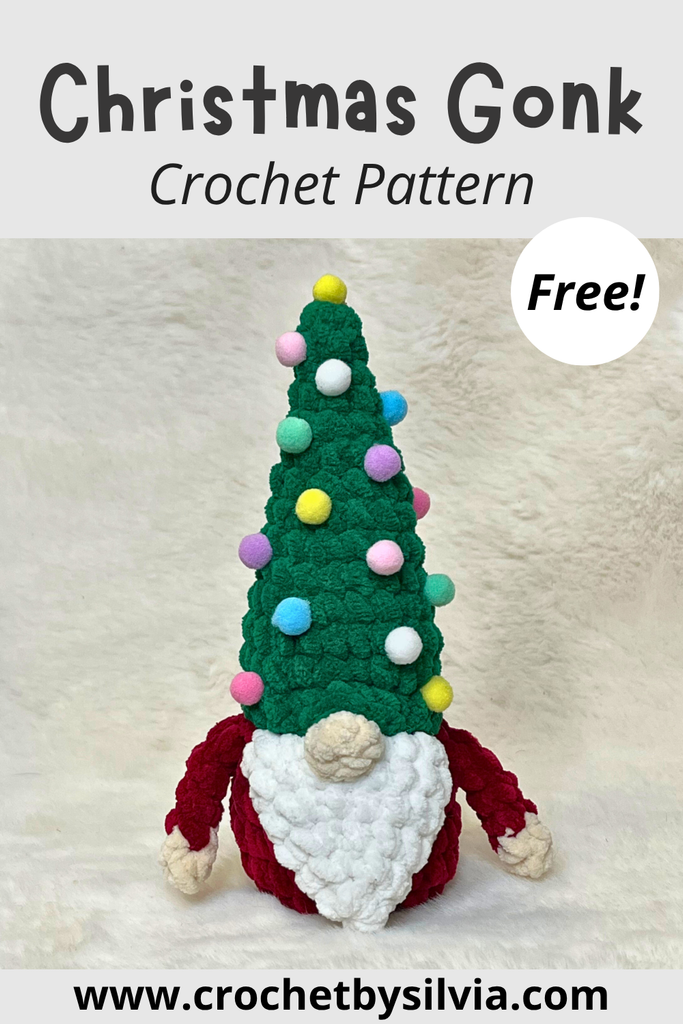Pinterest pin graphic for a free Christmas gnome crochet pattern showing a finished amigurumi Christmas tree gonk with green chenille yarn and colorful pom-poms.