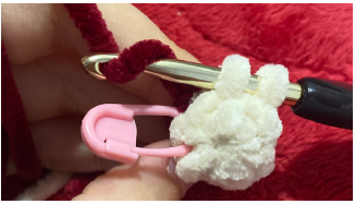 Step-by-step crochet tutorial showing how to attach the arms and textured beard for a Christmas gnome amigurumi.